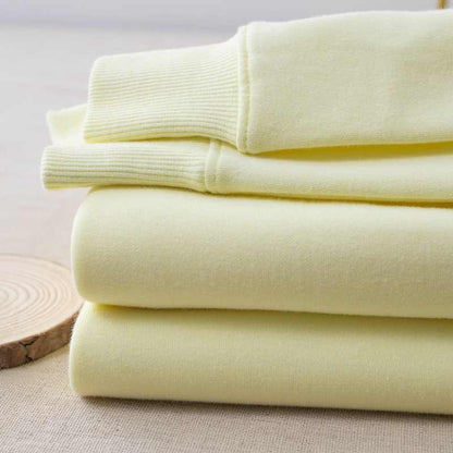 Pull col rond jaune pâle femme